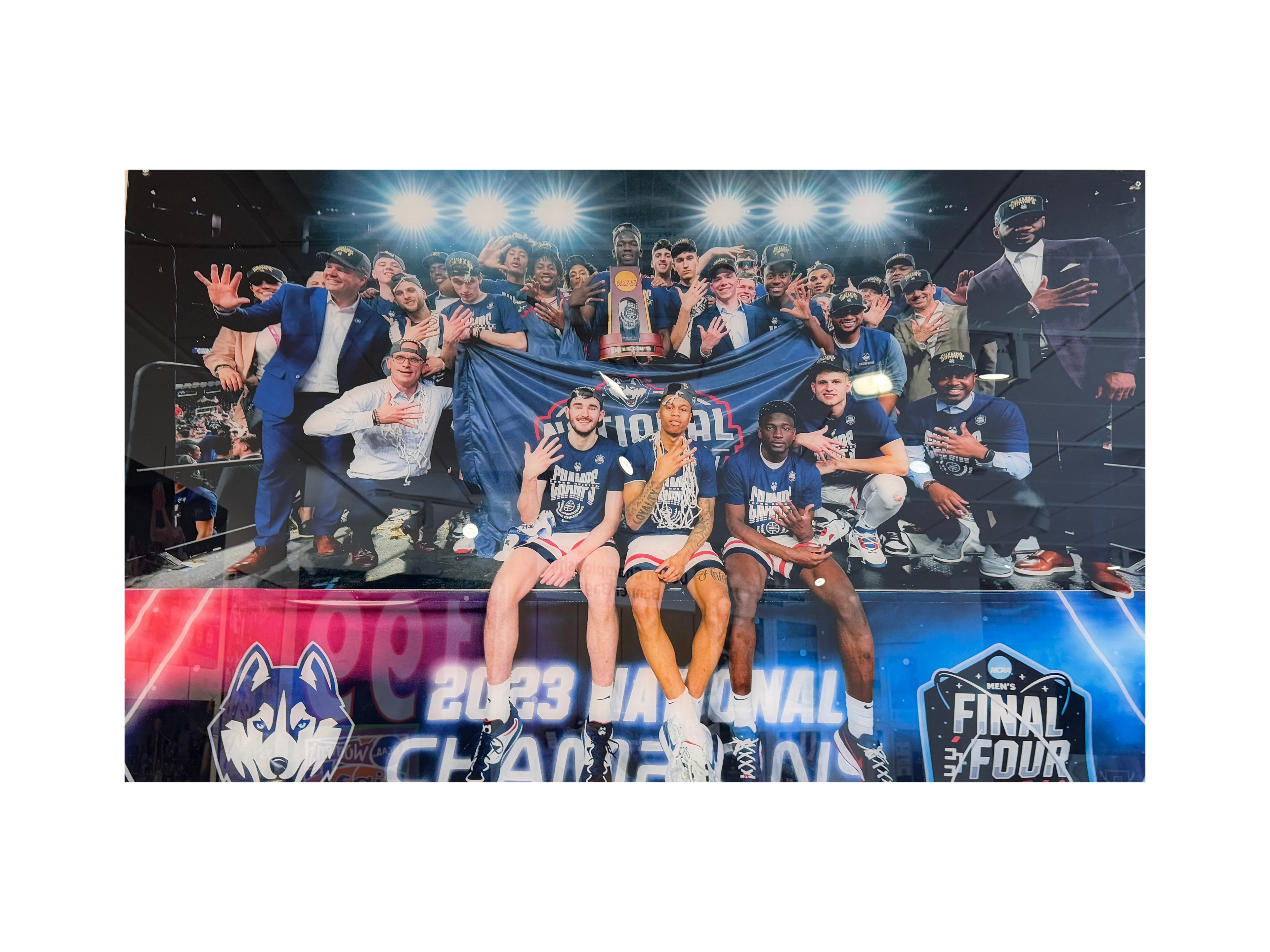 UConn 2023 National Champs Sitting Team Photo Large Acrylic Photo From Coaches Locker Room