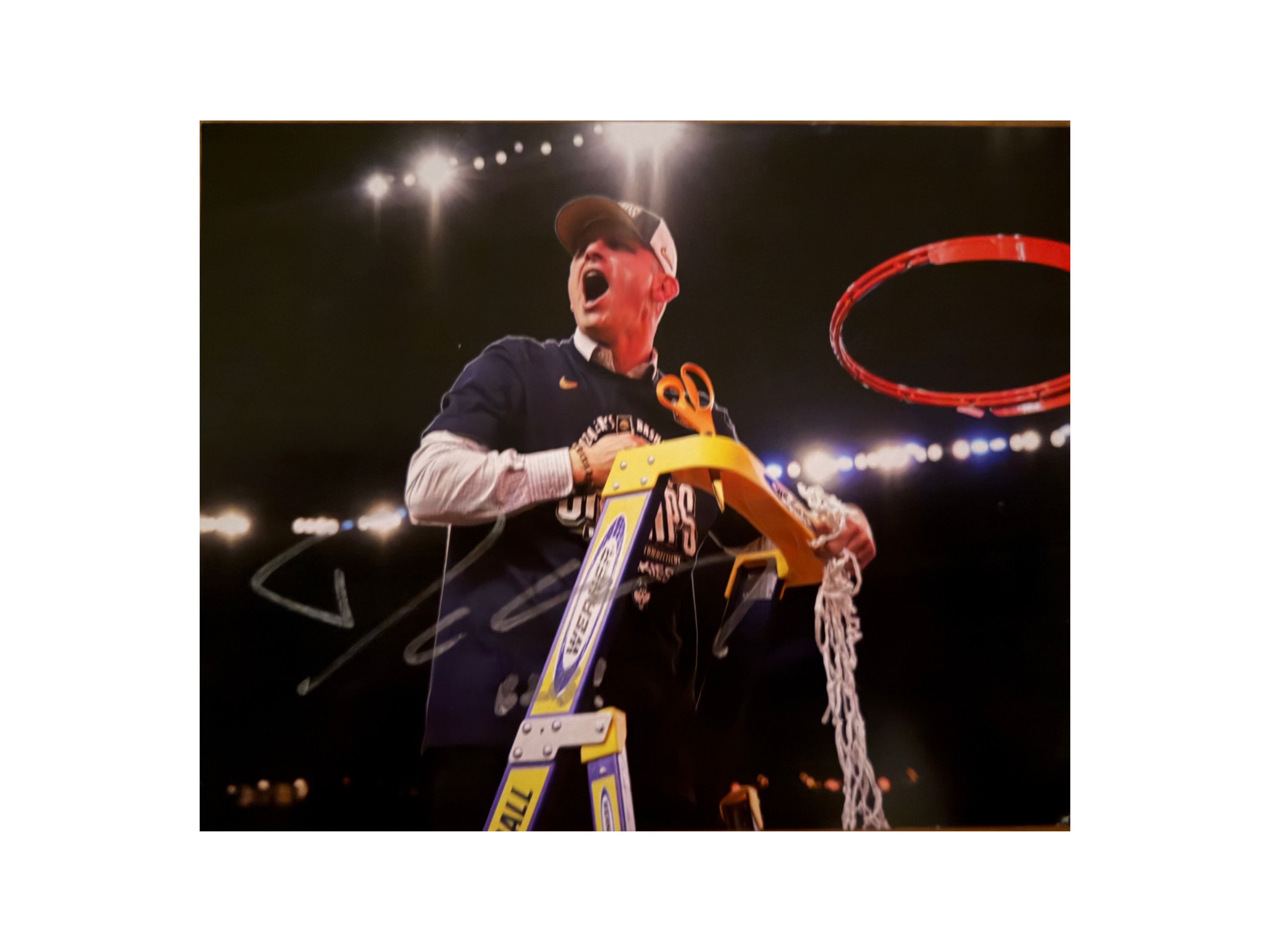 Dan Hurley Autographed Net Cutting Photo
