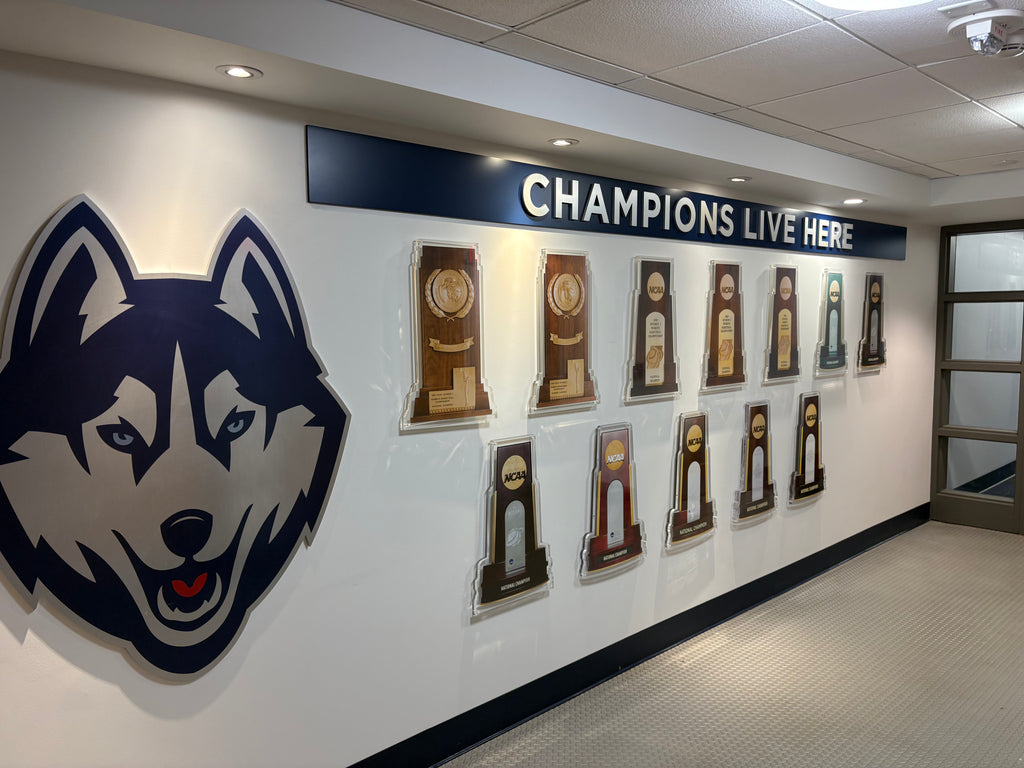 Metallic Husky Logo from Women’s Locker Room Exterior Wall