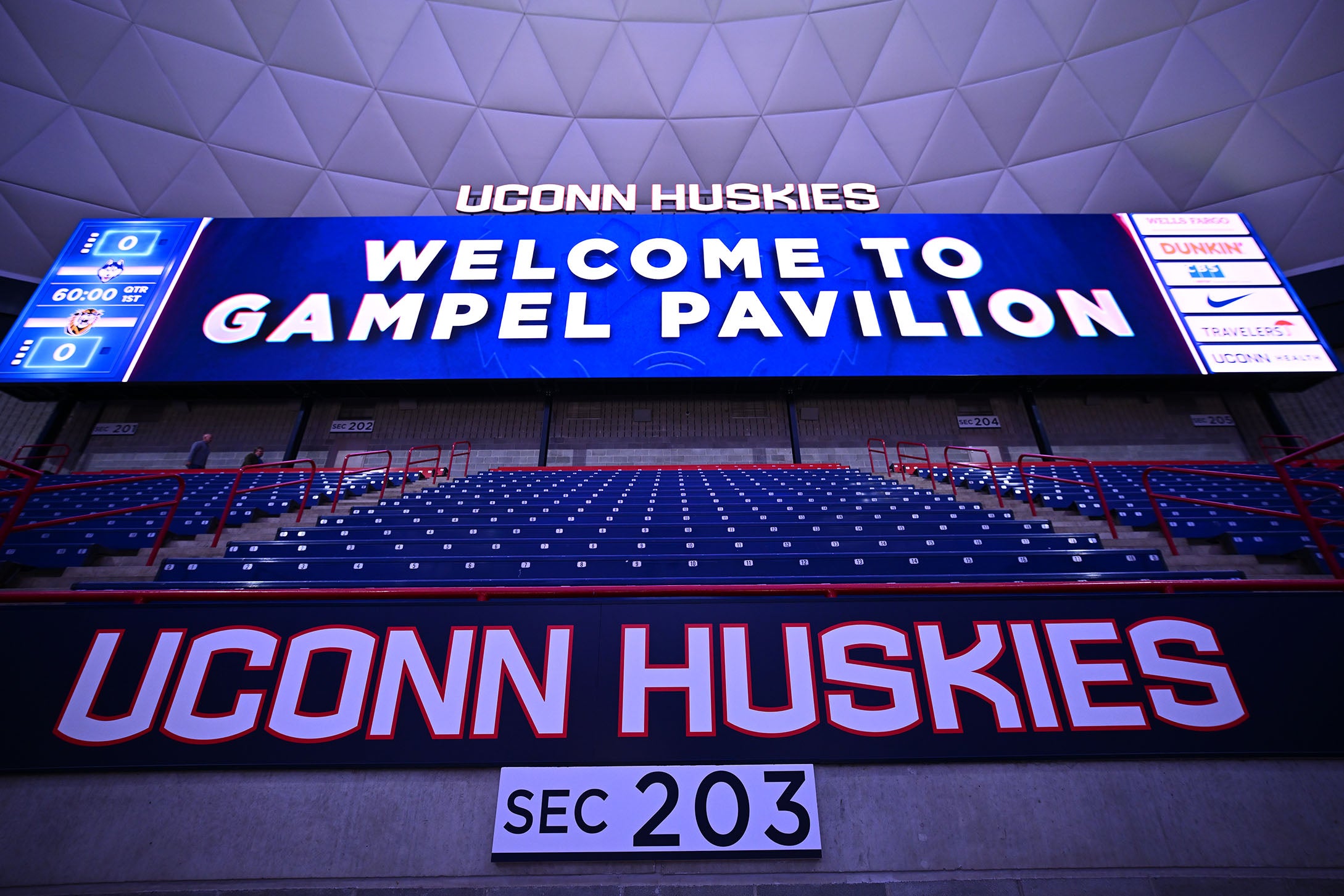 UConn Huskies welcome sign at Gampel Pavilion with seating area in the background