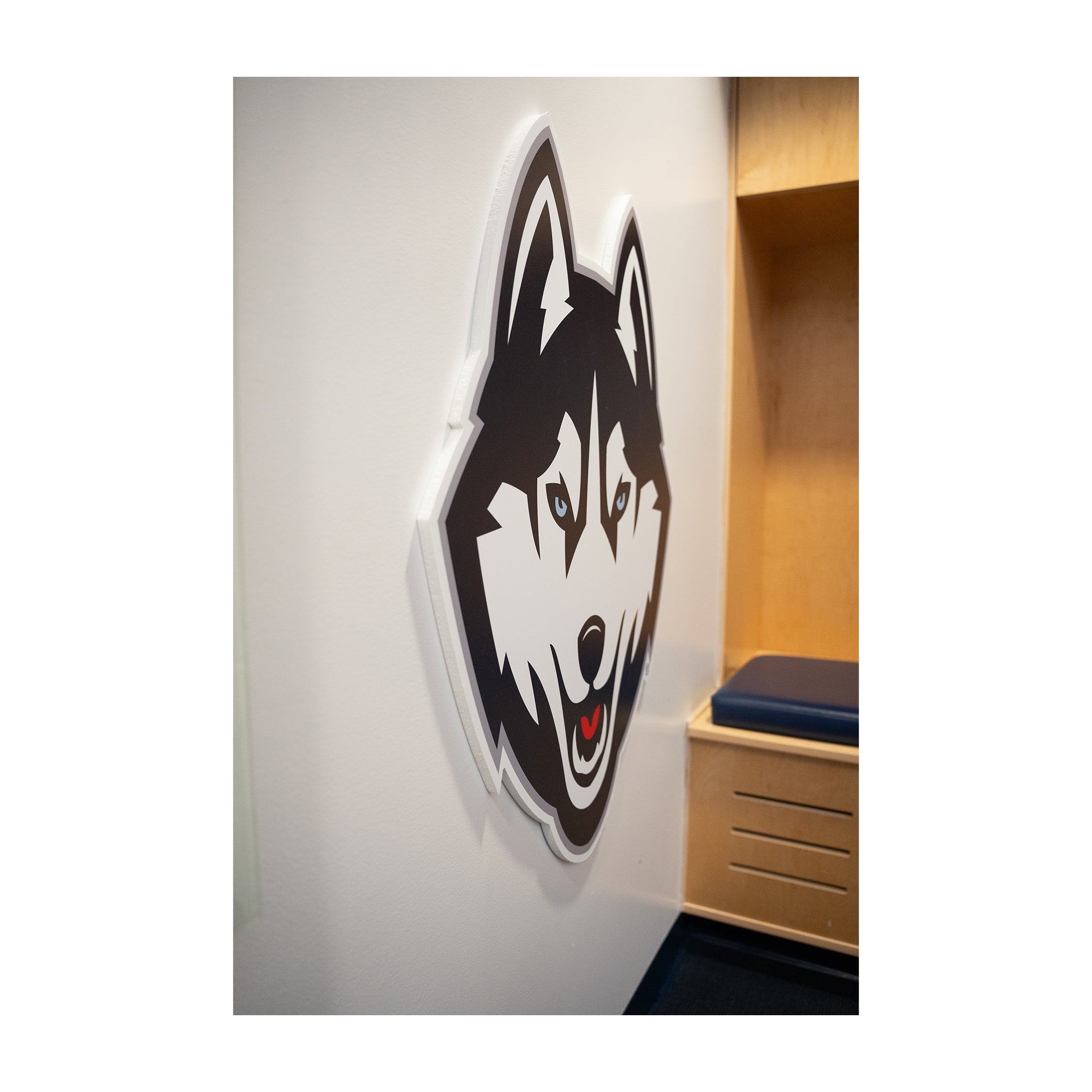 Women's Basketball Locker Room Husky Logo
