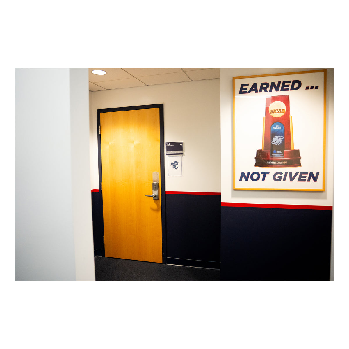 Women’s Locker Room “Earned… Not Given” Entrance Artwork