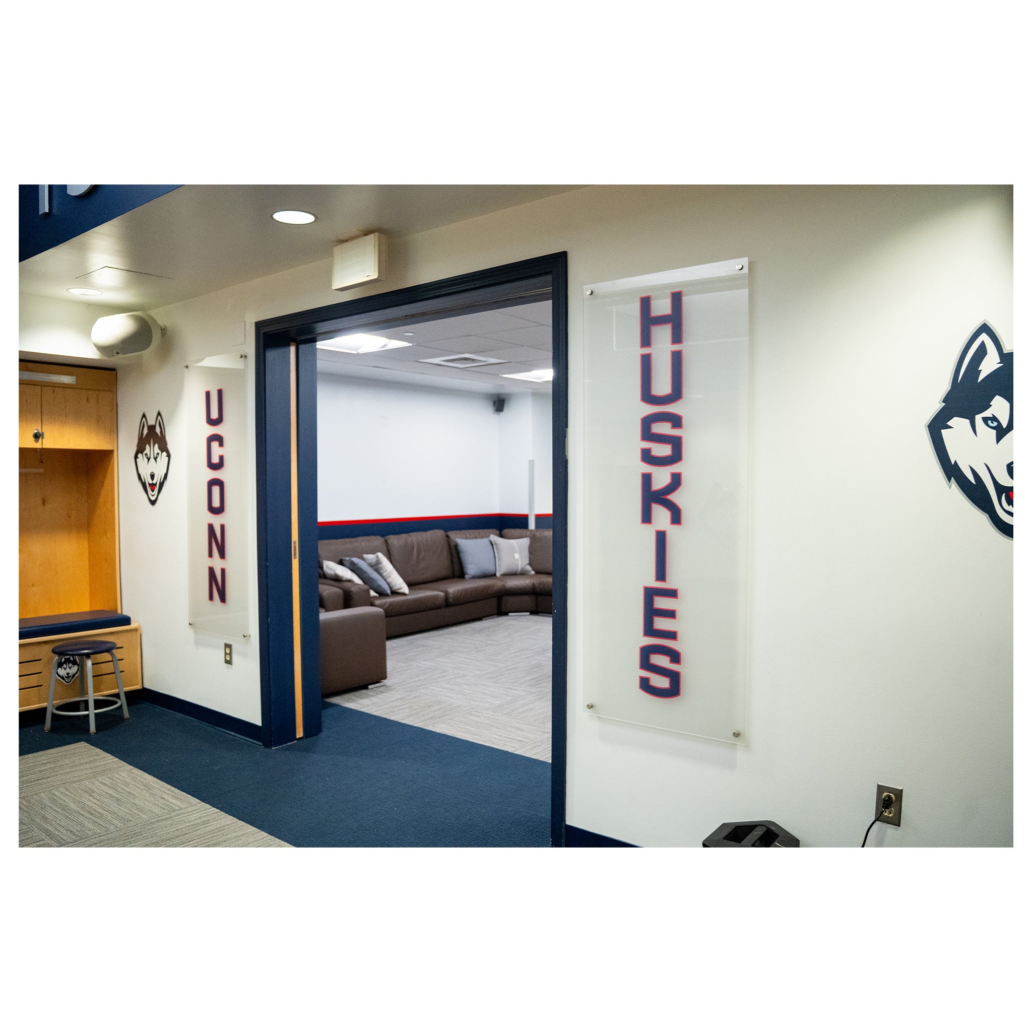 Women's Basketball Locker Room “UCONN” & “HUSKIES” Vertical Signs