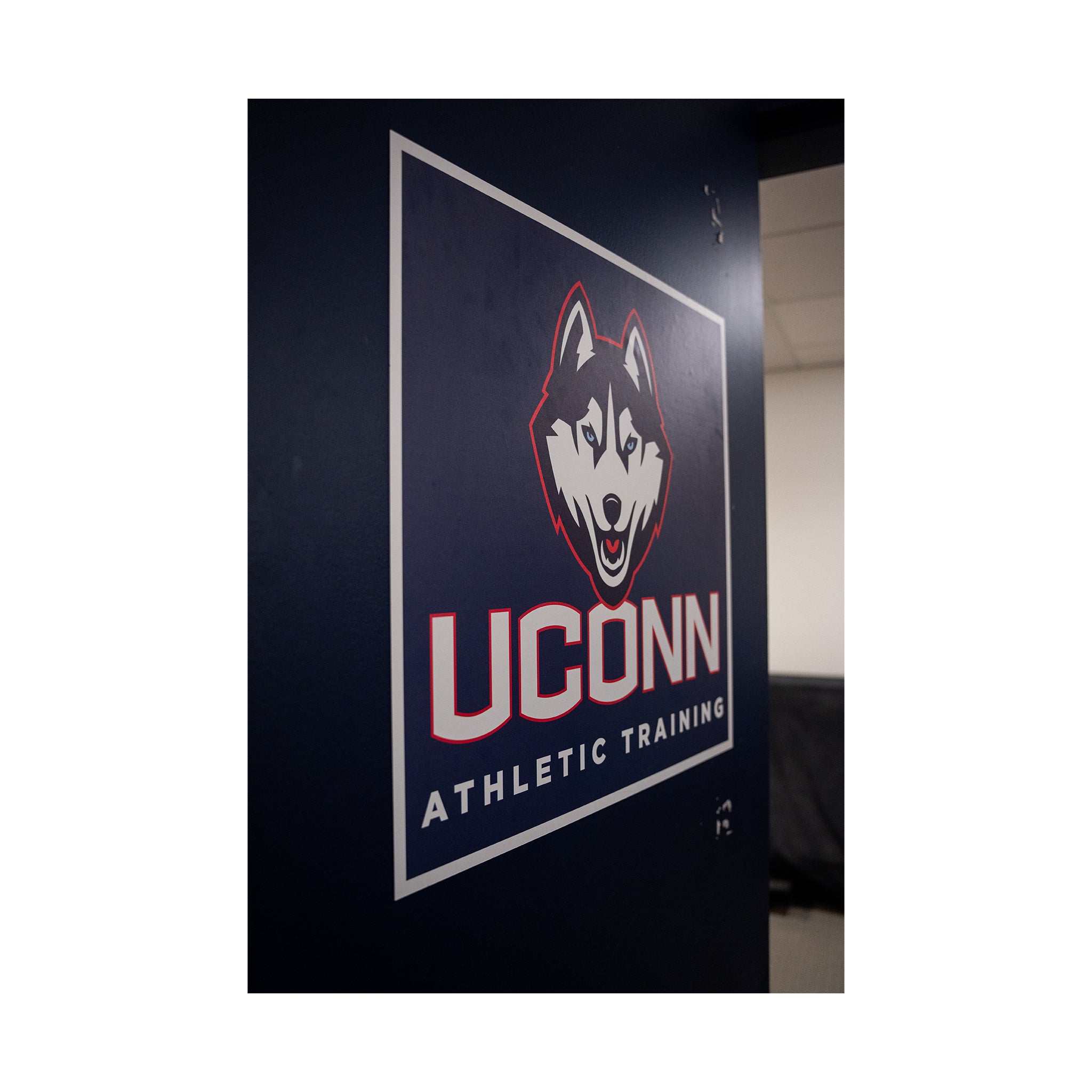 UConn Athletic Training Room Door Husky Logos