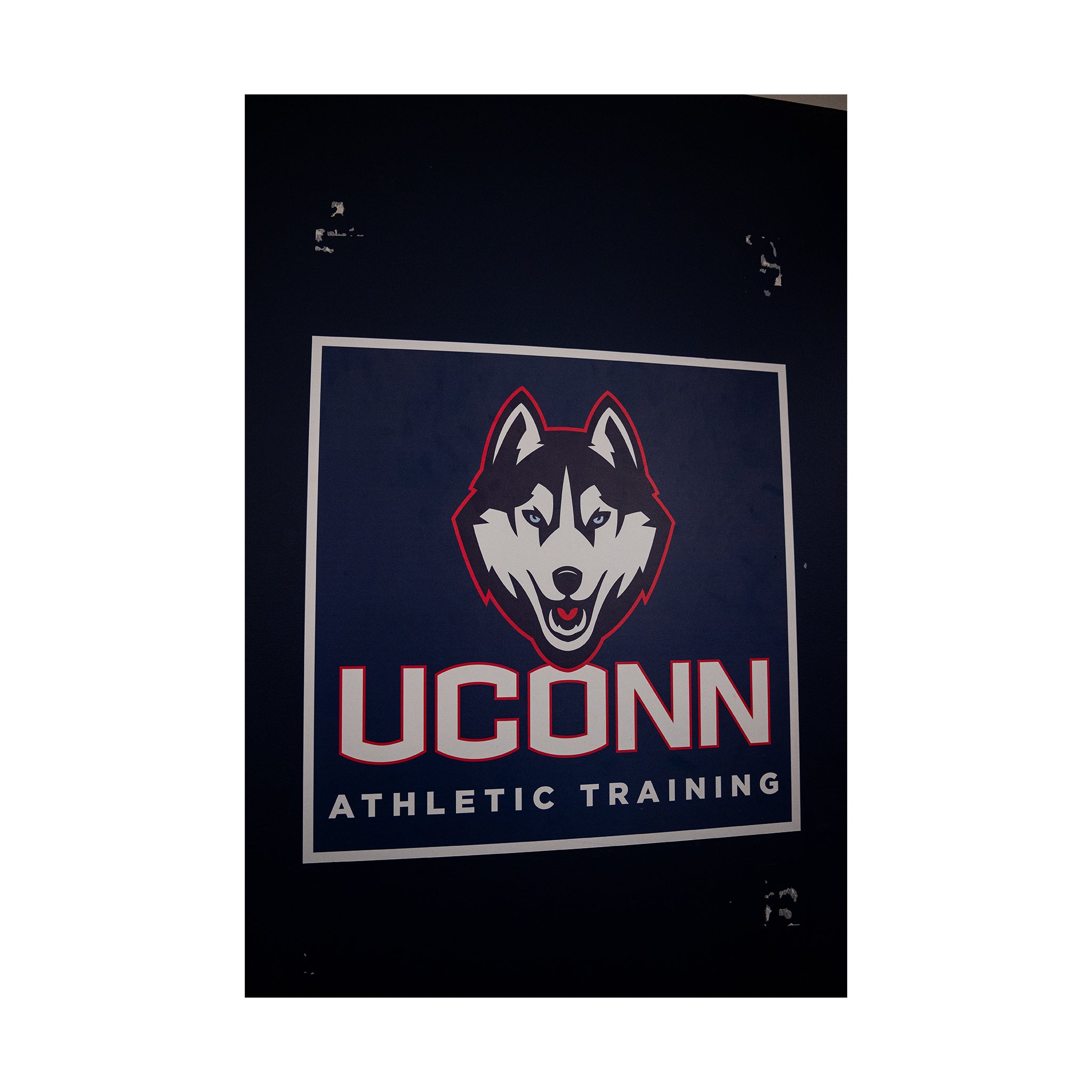 UConn Athletic Training Room Door Husky Logos